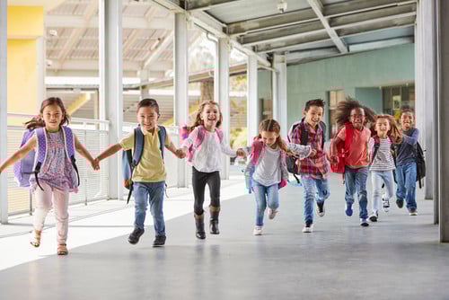 School kids running in the hallway